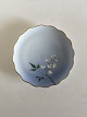 Bing & Grondahl 
Cake Plate with 
Flower 
Decoration and 
Goldrim. 17 cm 
diameter.