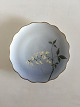 Bing & Grondahl 
Cake Plate with 
Flower 
Decoration and 
Goldrim. 17 cm 
diameter.