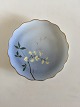 Bing & Grøndahl 
Cake Plate with 
Flower 
Decoration and 
Goldrim. 17 cm 
diameter.