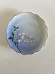Bing & Grondahl 
Cake Plate with 
Flower 
Decoration and 
Goldrim. 17 cm 
diameter.