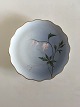 Bing & Grondahl 
Cake Plate with 
Flower 
decoration and 
goldrim. 17 cm 
diameter.