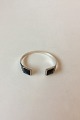 Regitze 
Overgaard for 
Georg Jensen. 
'Nocturne' 
armring af 
sterlingsølv 
prydet med to 
facetslebne ...