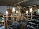 6-armet 
loftlampe 
lysekrone i 
forkromet metal 
omgivet af glas 
og med 6 store 
glasdråber, fra 
...