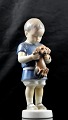 Bing og 
Grøndahl figur 
Ole med hund 
(1747). 
Designer 
Ingeborg 
Plockross 
Irminger
H.: 17,5cm ...