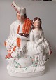 Staffordshire 
figur, fajance, 
medio 
1800-tallet. 
England. 
Delvist bemalet 
og forgyldt. 
Skotske ...