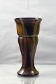 Brun og sort 
glas vase, det 
inderste 
glaslag er sort
H.: 18cm Ø.: 
9cm
Varenr.: 
325881