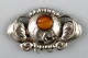 Danish Art 
Nouveau brooch 
in silver. 
Early 1900s.
Stamped.
Measures: 36 
mm.
In very good 
...