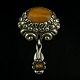 Danish Art 
Nouveau Silver 
Brooch with 
Amber - Knud 
Georg Jensen.
Designed and 
crafted by Knud 
...