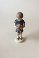 Bing og 
Grøndahl Figur 
- Dreng der 
holder en 
hund/Ole No. 
1747. Designet 
af Ingeborg ...