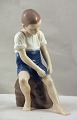 Bing & Grøndahl 
figur Dreng på 
klippeblok 
(1757). 
Designer 
Ingeborg 
Plockross 
Irminger
B&G ...