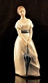 Diana figur , 
Hand made in 
Spain. Pige med 
blå paraply
Figuren måler 
Højde: 29 cm 
Diameter: ...