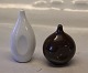 Stephensen Design Royal Copenhagen Salt, white 10 cm, & Pepper, brown  8 x 6 cm 
Design Magnus Stephensen