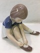 Fig.
Mädchen bindet 
Schuhe.
Bing & 
Gröndahl B & G 
Nr. 2317
1. Sortierung
Kontakttelefon 
...