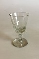 Holmegaard 
Dansk glas 
Wellington 
Hedvinsglas. 
Måler ca. 10,8 
cm