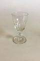 Holmegaard 
Dansk glas 
Christian VIII 
Hedvinsglas, 
Kugleslebet. 
Måler 11 cm
