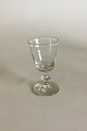 Holmegaard 
Wellington 
Hedvinsglas med 
glat kumme. 
Gammelt. Måler 
9,5 cm