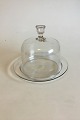 Cheese-dish 
covers. 
Holmegaard 
Glaswork. 
Measures 18 cm 
x 24 cm dia. / 
7 3/32 in. x 9 
29/64 in.