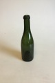 Bourgogne 
flaske, grøn, i 
Kastrup 
priskatalog fra 
1853. Måler 25 
cm. Med lille 
afslag foroven