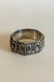 Topazio Sølv 
Armbånd. Måler 
5,9 cm indv. 
2,5 cm bredt. 
Vejer 51,7 gram