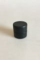 German 
"Kugelbecker" i 
black holder. 
With 
inscription 
"Trink aus und 
leg mich 
nieder, Steh 
ich ...