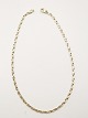 10 karat guld 
halskæde L. 42 
cm. B. 0,36 cm. 
 Nr. 334083