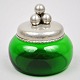 Danish 
bonbonniere in 
green glass 
with pewter 
lid, 20th 
century. 
Stamped: Dansk 
kunst tin. ...