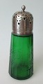 German sugar 
caster in green 
glass with 
engravings, art 
deco, approx. 
1920. With lid 
in silver ...