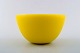 Orrefors 
"Colora" gul 
skål i 
kunstglas. 
Designet af 
Sven Palmqvist.
Måler : 16,5 
cm. x 10 ...