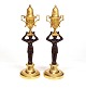 A pair of Empire gilt bronze candlesticks. Paris circa 1820. H: 30cm