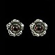 Georg Jensen. 
Sterling Silver 
Ear Clips with 
Garnet - 
Heritage 2002.
Based on 
original 
drawings ...