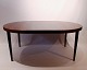 Dining table with two extentions in rosewood designed by Omann Junior from the 
1960s.
5000m2 showroom.