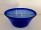 Thick milk bowl 
in blue glass 
with folded 
edge 1900s 
beginning from 
div. Danish 
glassworks • 
...