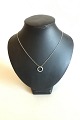 Chain in 14K. 
White gold with 
round pendant 
with 30 small 
stones. 
Measures, Chain 
46 cm / 18 ...