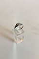 Ring i 14 K 
Hvidguld med 
Brillant. 
Ringstørrelse 
59. Vejer 4,43 
gram. Stempler 
Br.J 585 ...