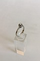 Ring i Hvidguld 
med Brillant i 
0.2 carat. 18 
K. 
Ringstørrelse 
56. Vejer 2.84 
gram. Stemplet 
...