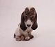 Dahl Jensen 
porcelain 
figure, Basset 
Hound, no. 
1065.
Dimensions: 
15x8.5x7.5 cm.
