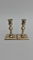 A pair of small 
baroque 
candlesticks 
Height 10.5cm