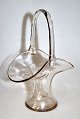 Glass vase in 
the form of a 
basket with a 
handle, clear 
glass, o. 1900. 
Denmark. 
Height: 20 cm. 
...