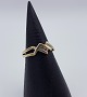 Ring i 14 karat 
guld, prydet 
med kvarts. 
Ringstr. 50,5 
Ø16
Varenr. 345103 
(L)