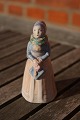 Hjorth Danish ceramics figurine, woman with hymn 
book in suit