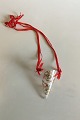 Royal 
Copenhagen 
Annual 
Christmas 
Cornet 1995. 
Measures 10 cm 
/ 3 15/16 in.