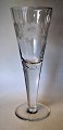 Glass cup, 
approx. 1910 
with cut flower 
motifs.