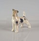 Foxterrier 
figur fra Royal 
Copenhagen. 
Figur nr. 
1452/2967.
Design af 
Platen 
Hallermundt
RC ...