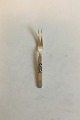 Georg Jensen 
Sterling Silver 
Scroll Cold 
Meat Fork No 
74. Measures 16 
cm / 5 29/32 
in.