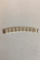 Georg Jensen & 
Wendel 14 K 
Hvidgulds 
armånd med 
perler og 
brillanter. 
Består af 108 
perler og 32 
...