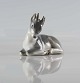 Liggende figur 
af hjortekid 
fra Royal 
Copenhagen nr. 
2648
Design af Knud 
Kyhn
Figuren er ...
