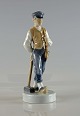 Figur af 
Vogterdreng fra 
Royal 
Copenhagen nr. 
620
Figur af 
vogterdreng med 
hammer
1. ...