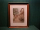 Radering af Leo 
Houlberg 
(1896-1950).
Motiv fra 
Puggårdsgade i 
Ribe.
H 35cm – B 
29cm, 
inkl.ramme