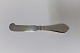 Georg Jensen. 
Sterling (925). 
Antik. 
Smørkniv. 
Længde 15,2 cm