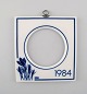 Royal 
Copenhagen 
årsramme fra 
1984 (stor) med 
ophæng i 
sterlingsølv af 
A. Michelsen. 
Måler: ...